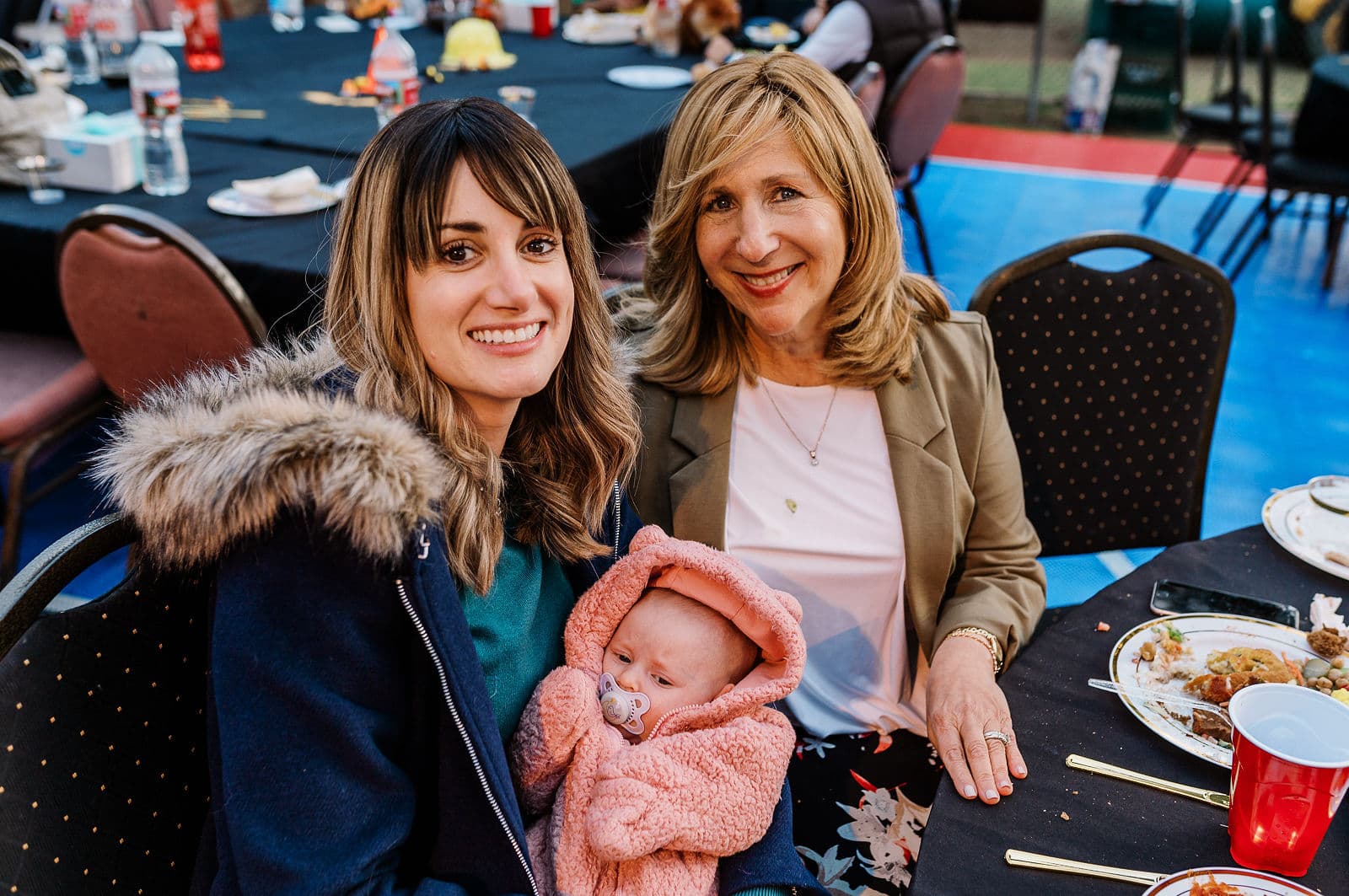 Three generations of a Beth Joseph family at a communal meal