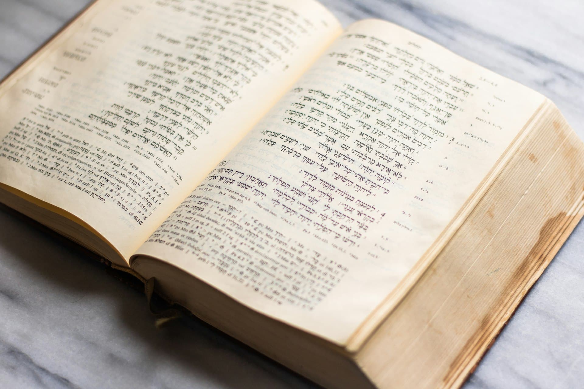 An open book waiting on a table