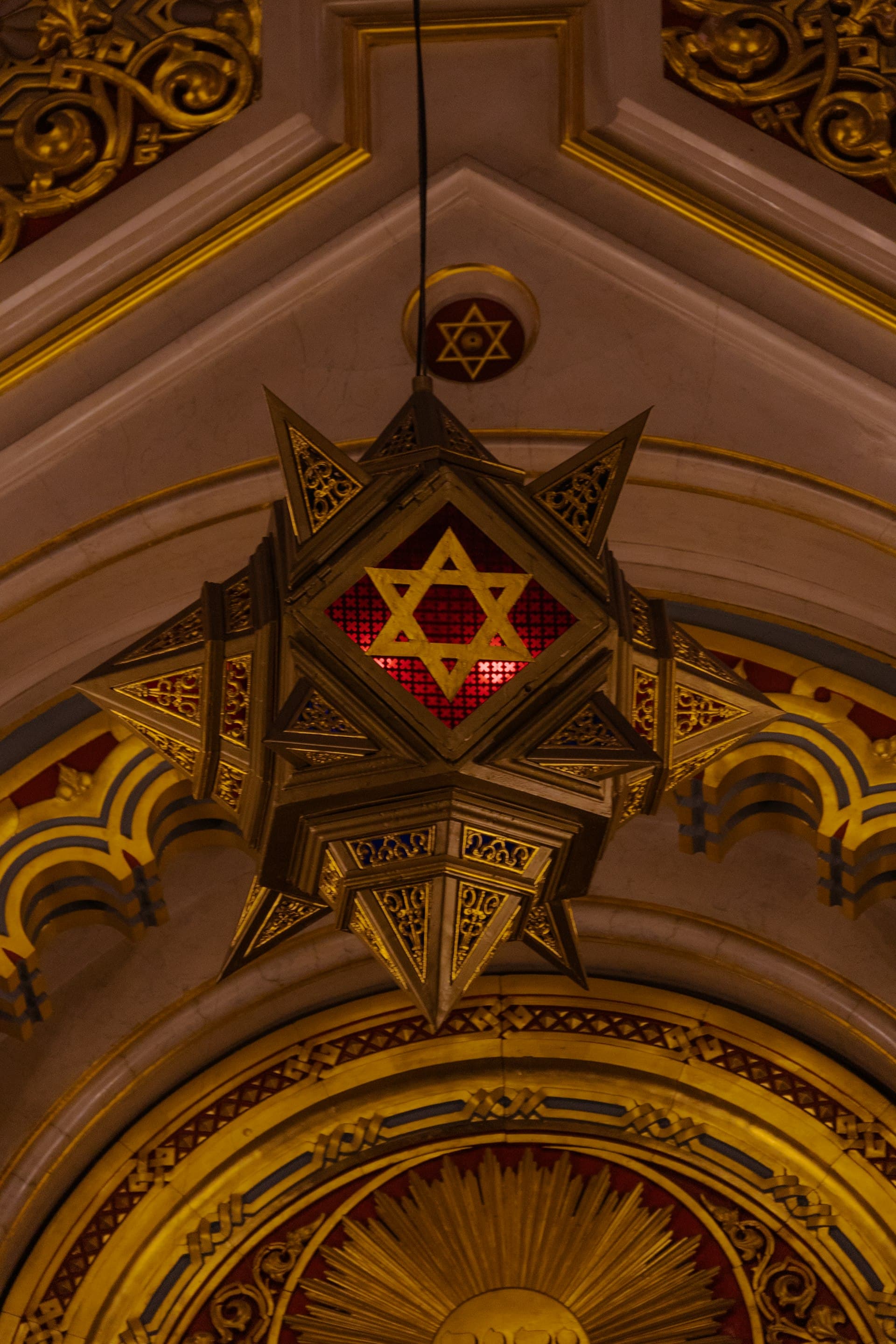 A Star of David emblem in soft light