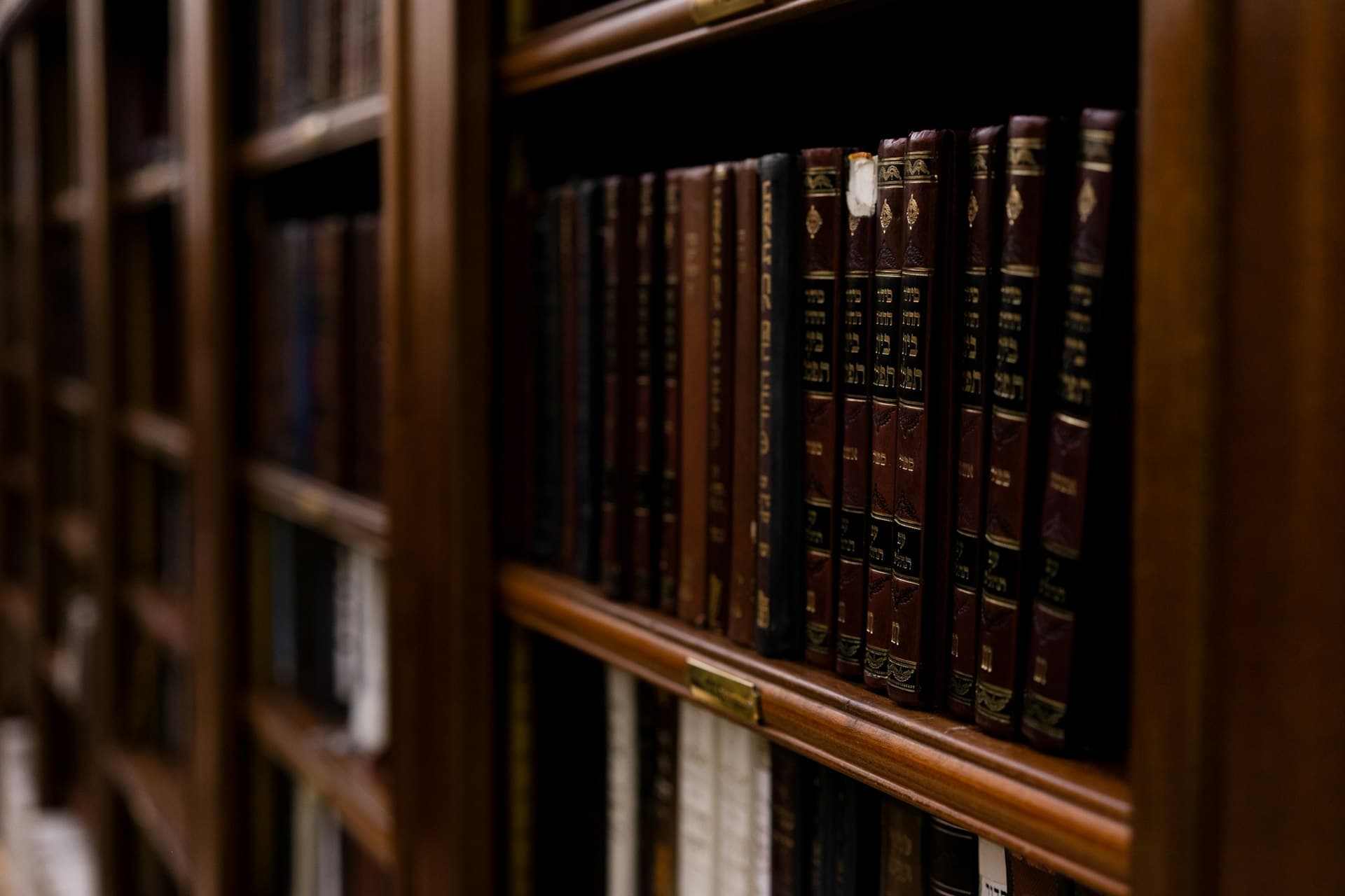 A library shelf of bound seforim